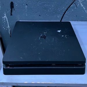 Ps4 Slim, with red camo controller and charger. comes with black ops 4